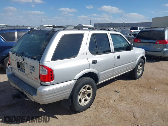 2001 Isuzu Rodeo S with VIN 4S2DM58WX14352481, listed as a IAAI auction lot 41796652 with 162,696 mi miles and . Bid and sale history available at DreamBid. Image 4.