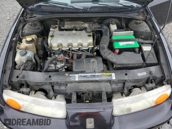 2000 Saturn SL z VIN 1G8ZH528XYZ160128, wystawiony jako Copart lot #64913404 z przebiegiem 172 587 mil mil oraz Czysty tytuł • Clean title. Historia ofert i sprzedaży dostępna na DreamBid. Obrazek 11.