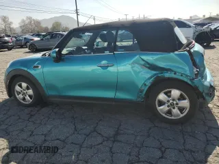 2019 MINI Convertible Cooper z VIN WMWWG5C50K3F79700, wystawiony jako Copart lot #45647955 z przebiegiem 65 168 mil mil oraz Szkoda całkowita • Salvage title. Historia ofert i sprzedaży dostępna na DreamBid. Obrazek 2.