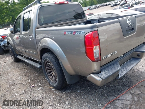 2005 Nissan Frontier LE with VIN 1N6AD07UX5C447844, listed as a IAAI auction lot 42184393 with 202,226 mi miles and . Bid and sale history available at DreamBid. Image 3.