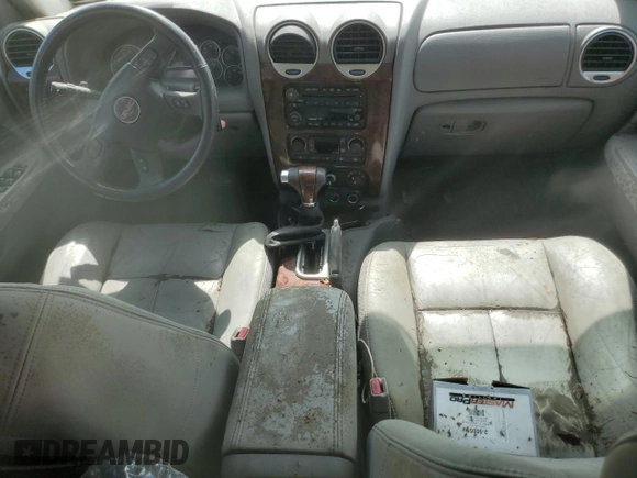 2005 GMC Envoy SLT with VIN 1GKDT13S052311455, listed as a Copart auction lot 73635434 with Not Provided miles and Salvage Title. Bid and sale history available at DreamBid. Image 8.