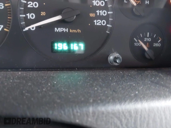 2002 Jeep Grand Cherokee with VIN 1J8GW38S62C219396, listed as a IAAI auction lot 41831930 with 196,167 mi miles and . Bid and sale history available at DreamBid. Image 7.