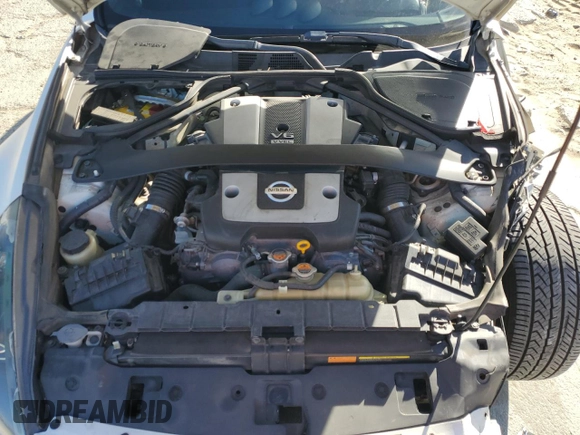 2014 Nissan 370Z Nismo with VIN JN1AZ4EH0EM635111, listed as a Copart auction lot 87292134 with 185,356 mi miles and Salvage Title. Bid and sale history available at DreamBid. Image 12.