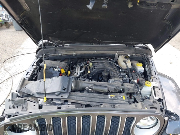 2022 Jeep Wrangler Unlimited Sahara Altitude z VIN 1C4HJXEG6NW103779, wystawiony jako IAAI lot #42563826 z przebiegiem 79 315 mil mil oraz . Historia ofert i sprzedaży dostępna na DreamBid. Obrazek 10.