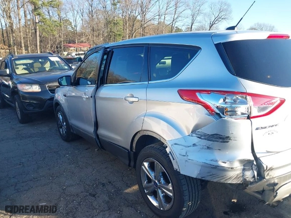 2015 Ford Escape SE with VIN 1FMCU0G92FUC74433, listed as a IAAI auction lot 41262018 with 114,252 mi miles. Bid and sale history available at carsss.com. Image 14.