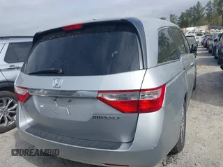 2012 Honda Odyssey EX-L with VIN 5FNRL5H66CB069916, listed as a IAAI auction lot 41935248 with 230,204 mi miles and . Bid and sale history available at carsss.com. Image 4.