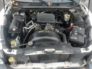 2005 Dodge Dakota SLT z VIN 1D7HW48K75S137100, wystawiony jako Copart lot #84155544 z przebiegiem 90 824 mil mil oraz Czysty tytuł • Clean title. Historia ofert i sprzedaży dostępna na DreamBid. Obrazek 13.