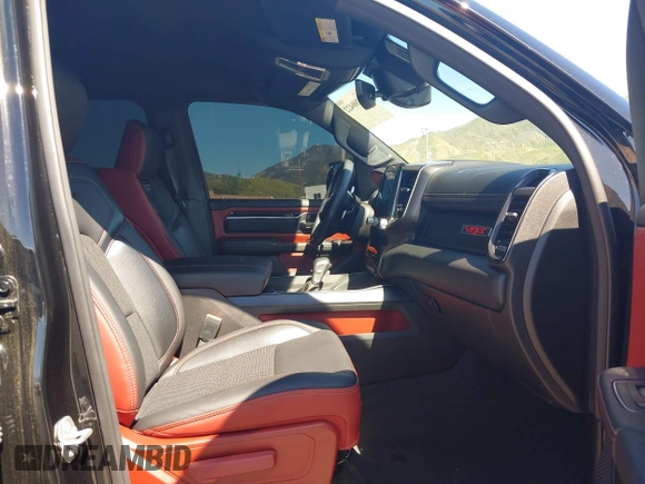 2022 Ram 1500 TRX with VIN 1C6SRFU95NN346475, listed as a IAAI auction lot 39200422 with 14,919 mi miles and . Bid and sale history available at DreamBid. Image 5.