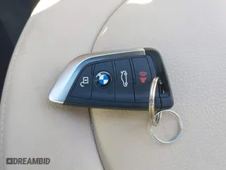 2018 BMW X1 sDrive28i with VIN WBXHU7C34J5H44572, listed as a IAAI auction lot 41607151 with 43,056 mi miles. Bid and sale history available at carsss.com. Image 11.