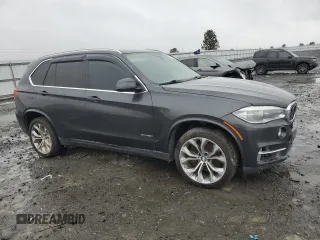 2014 BMW X5 xDrive50i with VIN 5UXKR6C52E0C02114, listed as a Copart auction lot 43034325 with 146,794 mi miles and Clean Title. Bid and sale history available at carsss.com. Image 4.