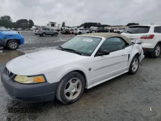 2004 Ford Mustang Deluxe with VIN 1FAFP446X4F179975, listed as a Copart auction lot 84551444 with 75,919 mi miles and Salvage Title. Bid and sale history available at carsss.com. Image 1.