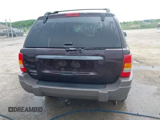 2004 Jeep Grand Cherokee Laredo z VIN 1J4GW48S94C209326, wystawiony jako IAAI lot #42309565 z przebiegiem 159 429 mil mil oraz . Historia ofert i sprzedaży dostępna na DreamBid. Obrazek 16.