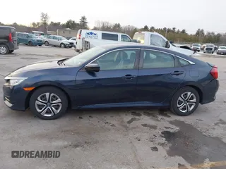 2017 Honda Civic LX z VIN 19XFC2F52HE028823, wystawiony jako IAAI lot #41312009 z przebiegiem 56 462 mil mil oraz . Historia ofert i sprzedaży dostępna na DreamBid. Obrazek 14.
