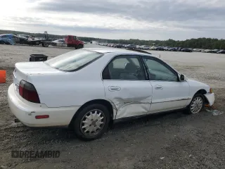 1996 Honda Accord EX with VIN 1HGCD5657TA001356, listed as a Copart auction lot 69712964 with 241,689 mi miles and Salvage Title. Bid and sale history available at carsss.com. Image 3.