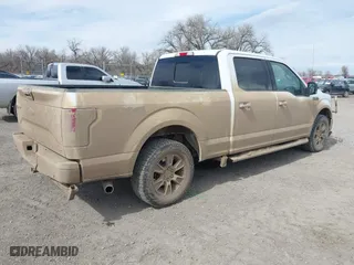 2015 Ford F-150 XLT w/HD Payload Pkg with VIN 1FTFW1EF3FFB70225, listed as a IAAI auction lot 41890185 with 169,564 mi miles. Bid and sale history available at carsss.com. Image 4.