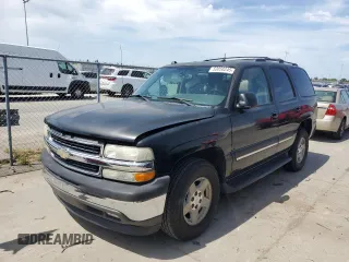 2005 Chevrolet Tahoe LT with VIN 1GNEC13T95J243128, listed as a Copart auction lot 53058245 with 142,075 mi miles and Salvage Title. Bid and sale history available at carsss.com. Image 1.