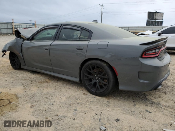 2019 Dodge Charger Scat Pack z VIN 2C3CDXGJ7KH646213, wystawiony jako Copart lot #51653065 z przebiegiem 63 229 mil mil oraz Szkoda całkowita • Salvage title. Historia ofert i sprzedaży dostępna na DreamBid. Obrazek 2.