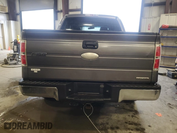 2011 Ford F-150 XL with VIN 1FTFW1CF3BFA90954, listed as a Copart auction lot 60242655 with 195,584 mi miles and Salvage title. Bid and sale history available at DreamBid. Image 6.