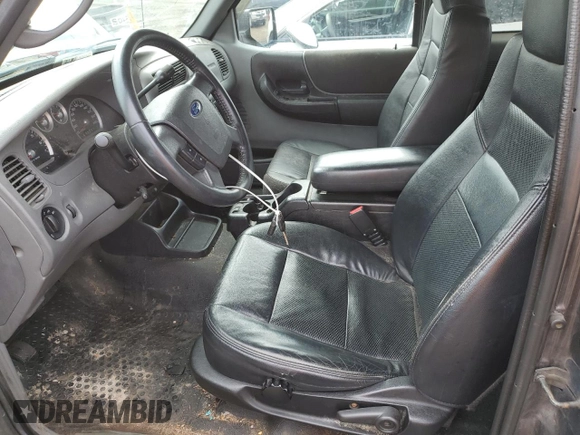 2009 Ford Ranger XLT with VIN 1FTZR45E89PA39013, listed as a Copart auction lot 55384165 with 323,139 mi miles and Clean title. Bid and sale history available at DreamBid. Image 7.