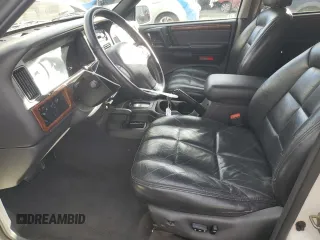1997 Jeep Grand Cherokee Limited with VIN 1J4GZ78Y7VC772292, listed as a Copart auction lot 87692445 with 0 mi miles and Salvage Title. Bid and sale history available at carsss.com. Image 7.