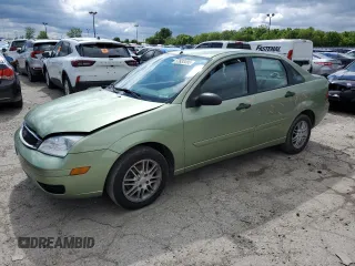 2007 Ford Focus S with VIN 1FAFP34N17W206910, listed as a Copart auction lot 57633495 with 204,385 mi miles and Salvage title. Bid and sale history available at DreamBid. Image 1.