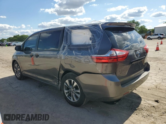 2017 Toyota Sienna L with VIN 5TDZZ3DC5HS818593, listed as a Copart auction lot 56942894 with 114,359 mi miles and Salvage Title. Bid and sale history available at DreamBid. Image 2.