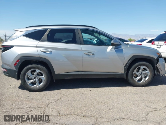 2023 Hyundai Tucson SEL z VIN 5NMJBCAE7PH239761, wystawiony jako IAAI lot #42159276 z przebiegiem 24 400 mil mil oraz . Historia ofert i sprzedaży dostępna na DreamBid. Obrazek 13.