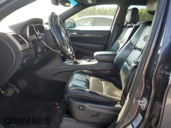 2017 Jeep Grand Cherokee Overland with VIN 1C4RJFCG9HC601806, listed as a Copart auction lot 61786275 with 122,898 mi miles and Salvage title. Bid and sale history available at DreamBid. Image 7.