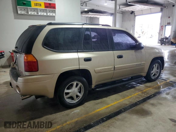 2005 GMC Envoy SLE with VIN 1GKDT13S352108513, listed as a Copart auction lot 51581475 with 160,610 mi miles and Salvage Title. Bid and sale history available at carsss.com. Image 3.