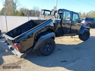 2021 Jeep Gladiator Sport S with VIN 1C6JJTAG4ML599463, listed as a IAAI auction lot 41312938 with 169,189 mi miles. Bid and sale history available at carsss.com. Image 4.