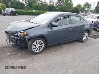 2018 Toyota Corolla L with VIN 2T1BURHE1JC007046, listed as a IAAI auction lot 42417100 with 69,845 mi miles and . Bid and sale history available at DreamBid. Image 2.