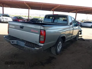 2000 Nissan Frontier XE with VIN 1N6DD26S9YC335405, listed as a IAAI auction lot 42342966 with 134,192 mi miles and . Bid and sale history available at DreamBid. Image 4.