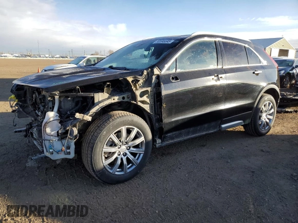 2020 Cadillac XT4 AWD Premium Luxury with VIN 1GYFZDR49LF032597, listed as a Copart auction lot 88595595 with 82,324 mi miles and Salvage title. Bid and sale history available at DreamBid. Image 1.