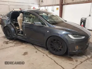 2016 Tesla Model X 70D with VIN 5YJXCBE2XGF025303, listed as a IAAI auction lot 41558869 with 77,793 mi miles. Bid and sale history available at carsss.com. Image 1.