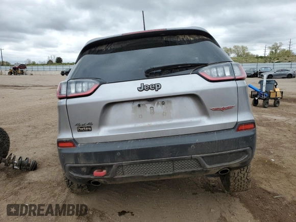 2021 Jeep Cherokee Trailhawk with VIN 1C4PJMBX2MD143446, listed as a Copart auction lot 55166945 with 83,841 mi miles and Salvage title. Bid and sale history available at DreamBid. Image 6.