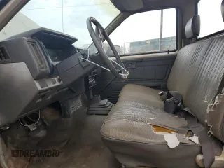 1986 Nissan Hardbody E z VIN JN6ND11S7GW014787, wystawiony jako Copart lot #45291425 z przebiegiem 171 557 mil mil oraz Szkody całkowita. Historia ofert i sprzedaży dostępna na DreamBid. Obrazek 7.