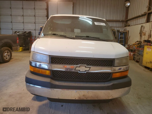2014 Chevrolet Express Passenger LT with VIN 1GAZG1FG6E1126290, listed as a Copart auction lot 76689113 with 120,518 mi miles and Salvage Title. Bid and sale history available at carsss.com. Image 5.