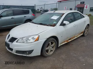 2009 Pontiac G6 1SB with VIN 1G2ZJ57K294240301, listed as a IAAI auction lot 42437339 with 138,984 mi miles and . Bid and sale history available at DreamBid. Image 2.