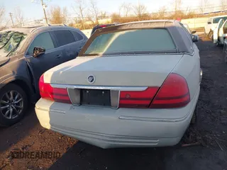 2003 Mercury Grand Marquis LS Premium with VIN 2MEHM75W53X704387, listed as a IAAI auction lot 41838775 with 312,869 mi miles and . Bid and sale history available at DreamBid. Image 16.