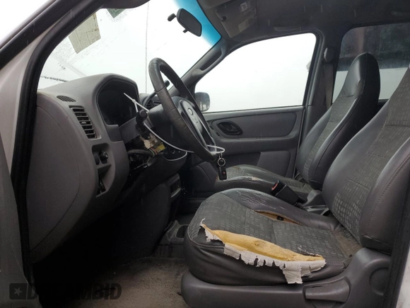 2001 Ford Escape XLS with VIN 1FMYU01191KA29996, listed as a Copart auction lot 86362534 with 265,271 mi miles and Salvage title. Bid and sale history available at DreamBid. Image 7.