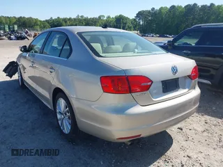 2013 Volkswagen Jetta TDI w/Premium/Nav with VIN 3VWLL7AJXDM233999, listed as a IAAI auction lot 42126691 with 151,658 mi miles and . Bid and sale history available at DreamBid. Image 3.