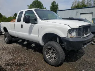 2004 Ford F-250 XL with VIN 1FTNX21P34ED08796, listed as a Copart auction lot 54789995 with 141,634 mi miles and Salvage title. Bid and sale history available at DreamBid. Image 4.