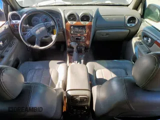 2003 GMC Envoy SLT z VIN 1GKDS13S332281271, wystawiony jako Copart lot #53685775 z przebiegiem 236 997 mil mil oraz Szkody całkowita. Historia ofert i sprzedaży dostępna na DreamBid. Obrazek 8.