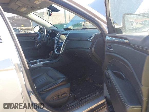 2013 Cadillac SRX Performance Collection z VIN 3GYFNHE33DS540108, wystawiony jako IAAI lot #42061957 z przebiegiem 182 797 mil mil oraz . Historia ofert i sprzedaży dostępna na DreamBid. Obrazek 5.