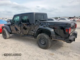 2023 Jeep Gladiator Freedom with VIN 1C6HJTAG7PL531273, listed as a Copart auction lot 56743255 with 41,226 mi miles and Salvage title. Bid and sale history available at DreamBid. Image 2.