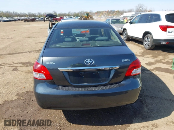 2009 Toyota Yaris with VIN JTDBT903194047784, listed as a IAAI auction lot 42049872 with 115,735 mi miles. Bid and sale history available at carsss.com. Image 16.