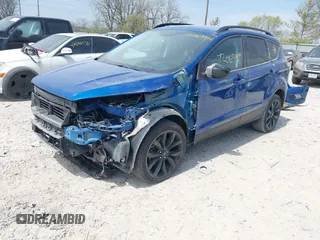2017 Ford Escape SE with VIN 1FMCU0G94HUE90206, listed as a IAAI auction lot 42069904 with 86,883 mi miles. Bid and sale history available at carsss.com. Image 2.