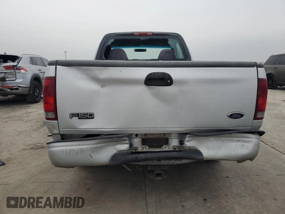 2002 Ford F-150 XL with VIN 1FTRF172X2NB77521, listed as a Copart auction lot 43993885 with 339,289 mi miles and Salvage Title. Bid and sale history available at carsss.com. Image 6.