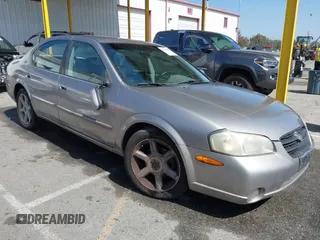 2001 Nissan Maxima GXE with VIN JN1CA31D41T815592, listed as a IAAI auction lot 42465005 with 96,822 mi miles and . Bid and sale history available at DreamBid. Image 1.
