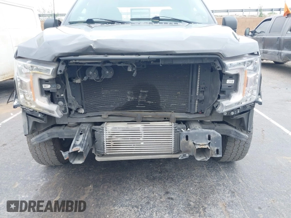 2018 Ford F-150 XL z VIN 1FTEW1CP1JKF15209, wystawiony jako IAAI lot #42048362 z przebiegiem 95 882 mil mil oraz . Historia ofert i sprzedaży dostępna na DreamBid. Obrazek 18.